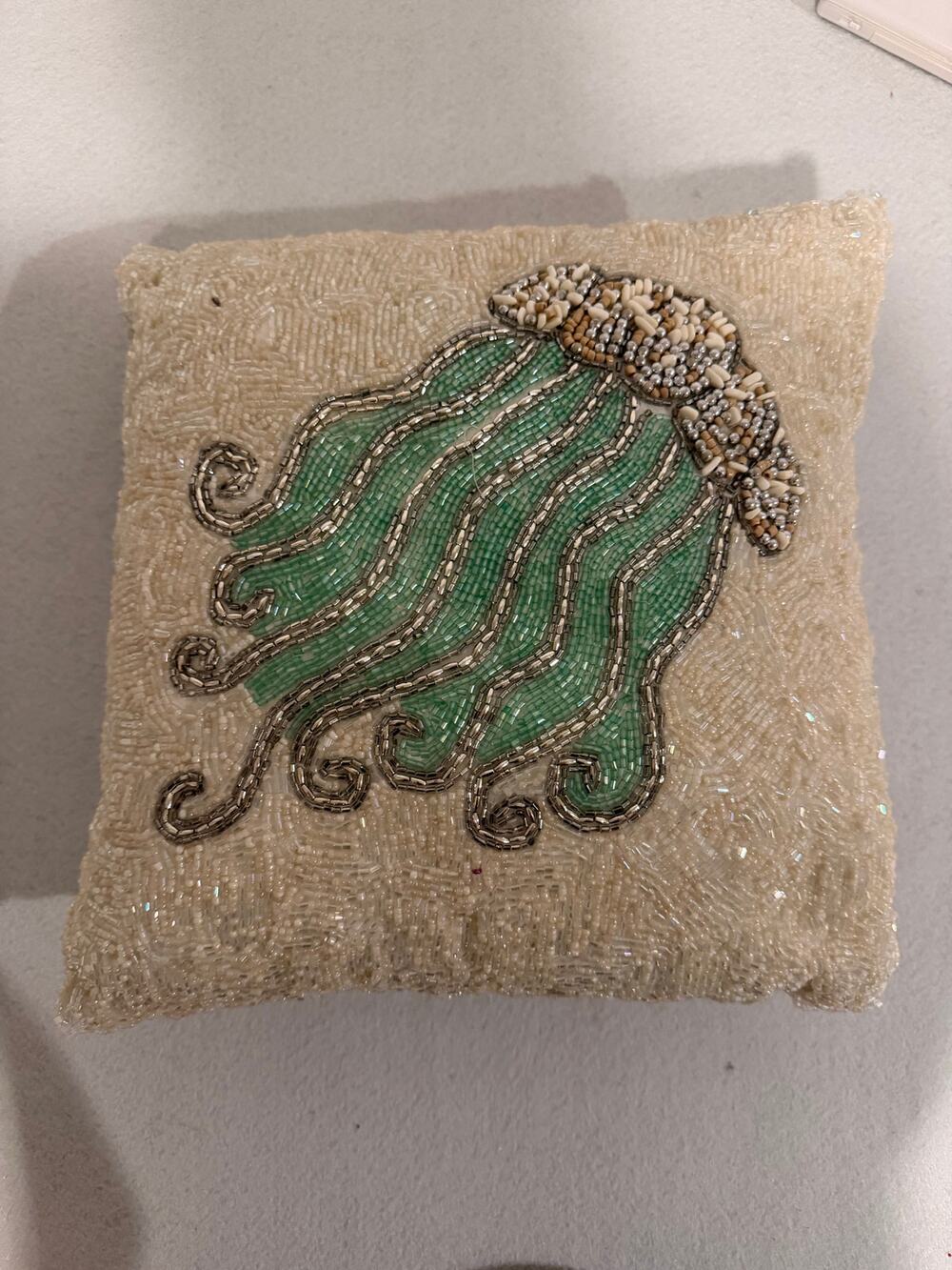 Jellyfish beaded coastal pillow decor